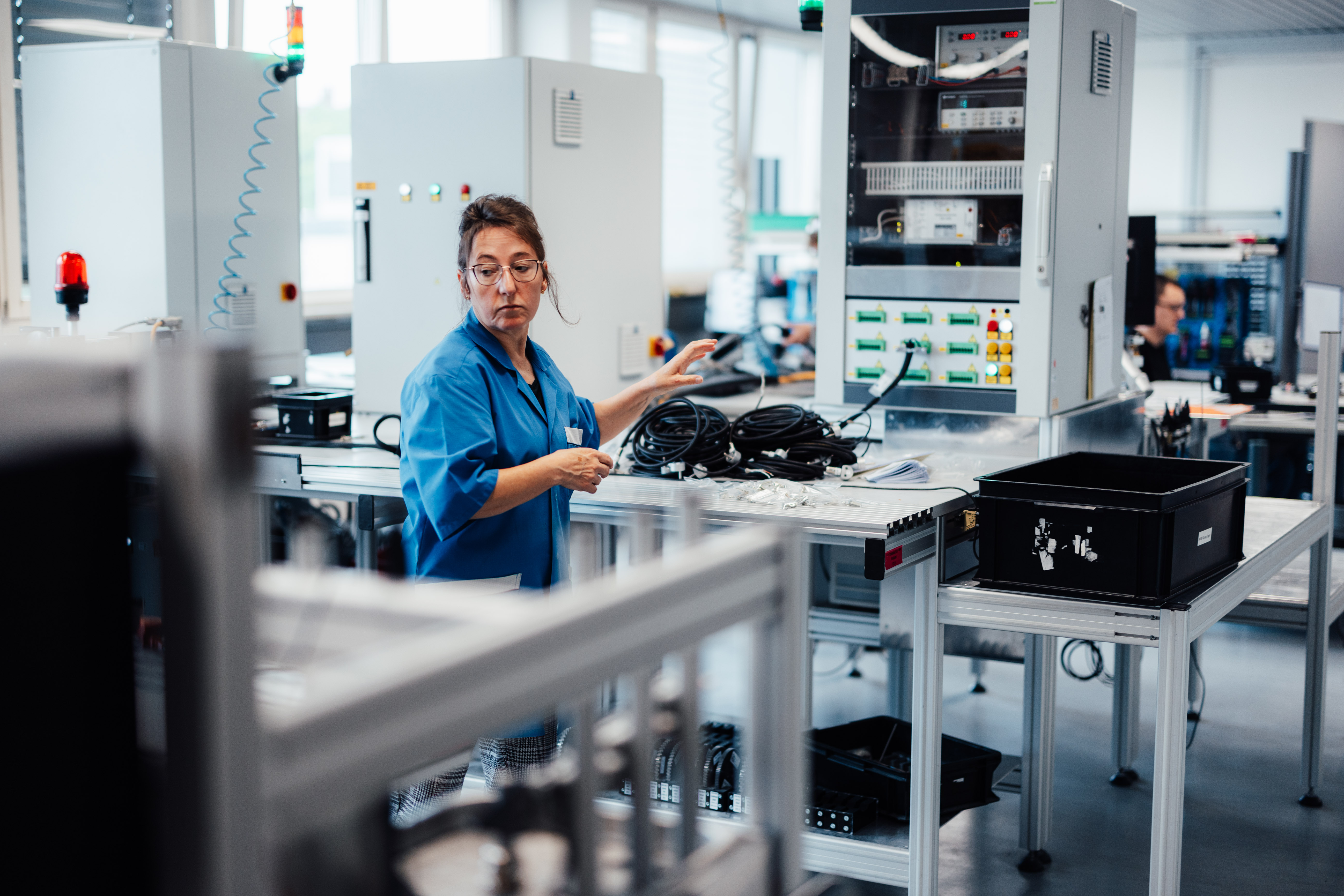 employee works in field testing station